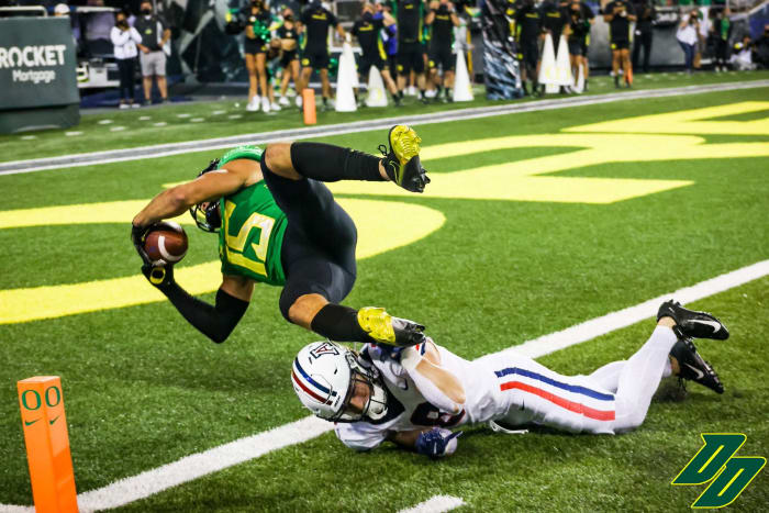 Williams dives into the end zone to cap off a 68-yard interception return late in the fourth quarter.